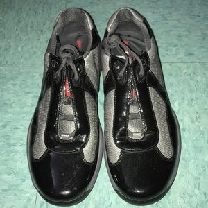 Black and Gray patent leather Prada’s